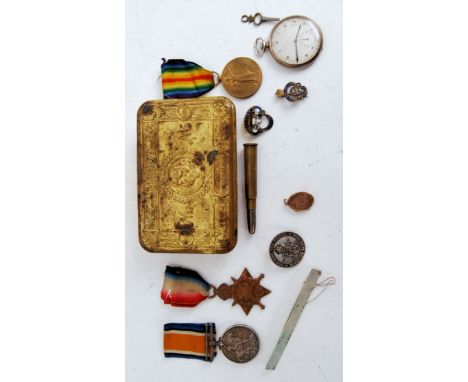 An original First World War WWI medal group, awarded to a 2507 Pte F Nott, Gloucs. Along with cab badge, wound badge, watch a