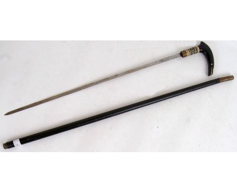 A 20th century Indian made sword walking stick / cane. With hidden sword blade, bone carved ring to handle and elongated ebon