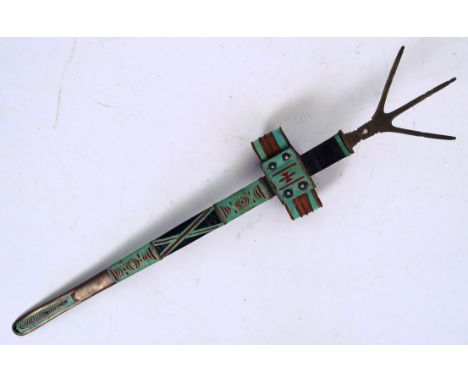 A rare 19th century Sudanese origin Tuareg long arm sword. Highly decorative scabbard with brass bird claw style back dagger.