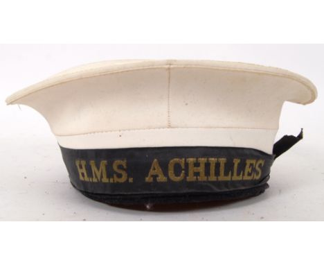 An original vintage HMS Achilles sailors uniform hat. With notation to front.   HMS Achilles was a Warrior-class armoured cru