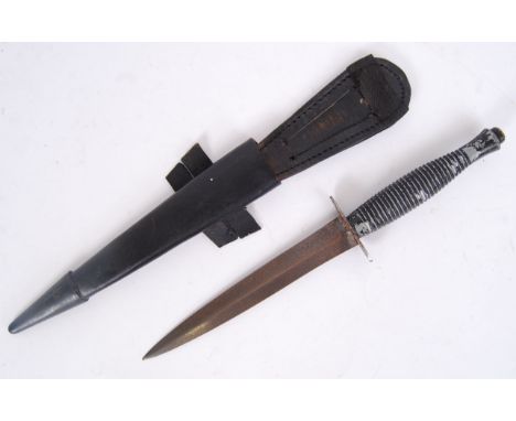 An original SAS Fairbairn Sykes style commando fighting knife / dagger. The blade marked with an SAS motif. Within the origin