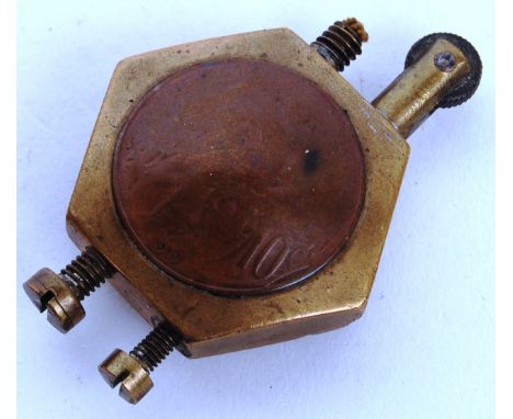 An original rare piece of WWI First World War trench art cigarette lighter. Made from likely a large tank nut, the lighter si