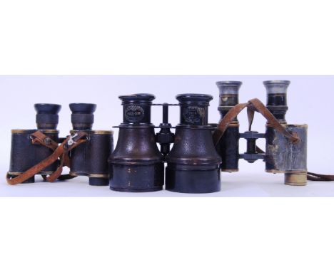 A collection of three pairs of antique binoculars. The first pair being Watson &amp; Sons 1917, the second Bull Dog Of Paris 
