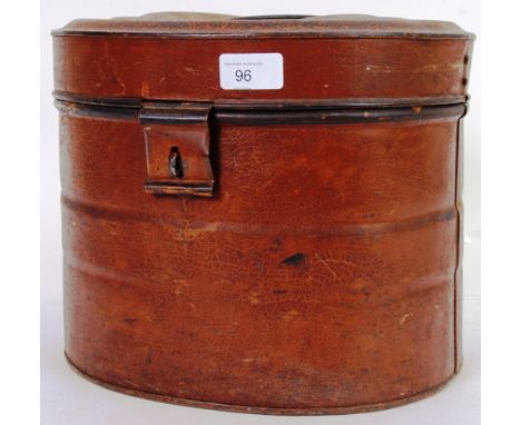 An  Oval Tin Hat Box, 12”/30cm wide, 9.5”/24cm tall. POSTAGE: Worldwide postage / delivery available on all items. Combined p