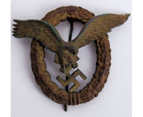 An original WWII Second World War Third Reich Luftwaffe Badge. Featuring the German eagle to centre with laurel leaf surround