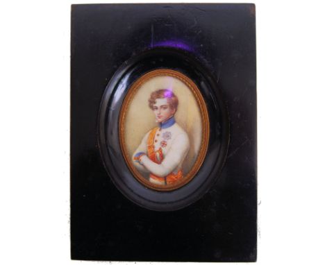 An antique 19th century portrait miniature on ivory. Depicting a boy / young gent in full military uniform. Finely painted. S