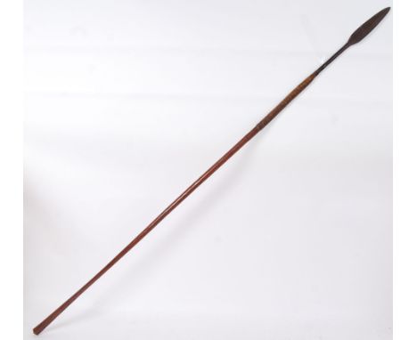 A rare 19th century Zulu tribal spear. Elongated shaft, with tapered end. 143cm long. POSTAGE: Worldwide postage / delivery a