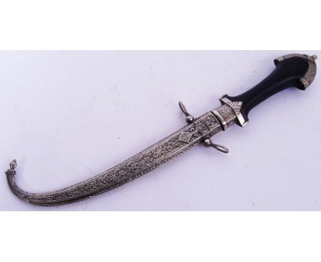 An original 20th century Moroccan Takouba / Jambiya sword / dagger. Silver (white metal) scabbard, with highly detailed decor