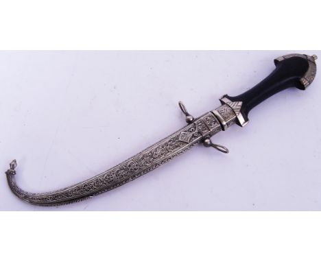 An original 20th century Moroccan Takouba / Jambiya sword / dagger. Silver (white metal) scabbard, with highly detailed decor