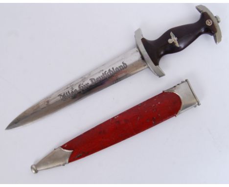 An original WWII Second World War Third Reich German SA Dagger. The blade marked for F. Herder. Within the original scabbard.