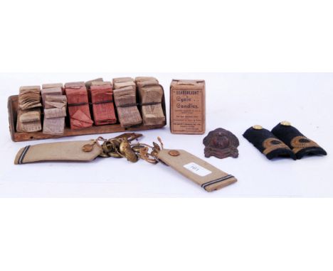 A mixed collection of military &amp; transport related items to include; various uniform buttons and lapels, a rare box of un