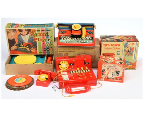 Boxed tinplate novelties x four including: (1) Codeg, Telephone Exchange; (2) Mettype Toy Typewriter; (3) Kitchen Stove; (4) 