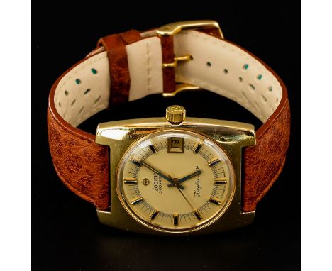 Chronometer, with inset aquamarine, leather band, case is 32 mm. in diameter.