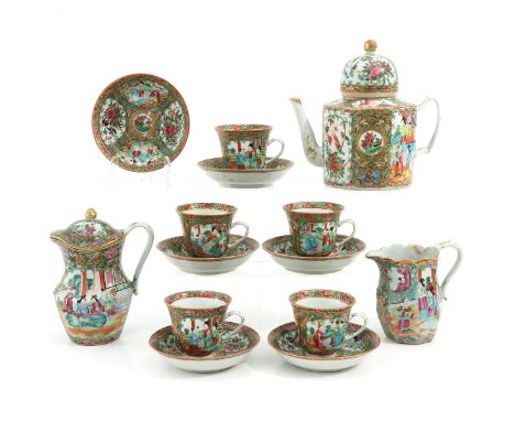 14 Pieces, including teapots, creamer, cups and saucers, teapot is 22 cm. tall.