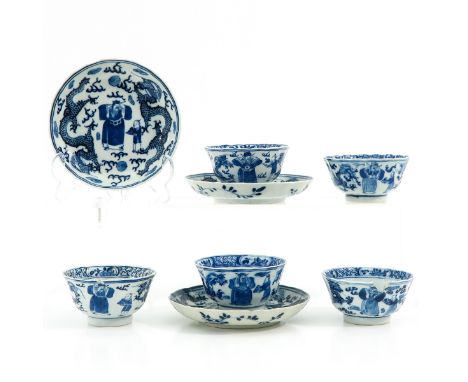 Including 5 cups and 3 saucers, blue and white decor depicting dragons and Chinese dignataries, Kangxi Mark and Period, sauce