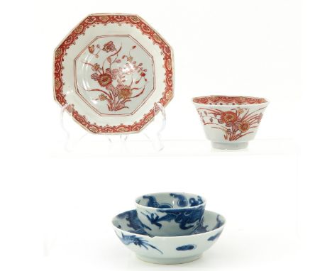 Blue and white dragon and milk and blood decor, including 18th Century, saucers are 12 cm. in diameter, chip.