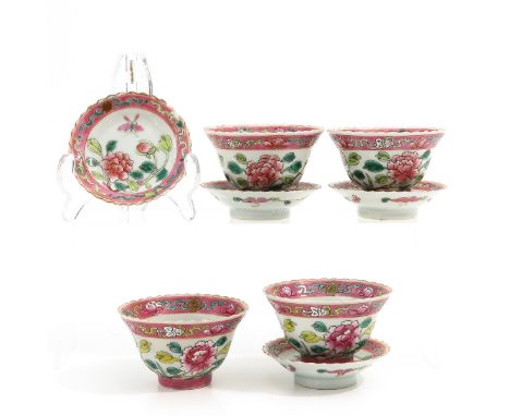 Famille Rose floral decor, saucers are 8 cm. in diameter, chip.