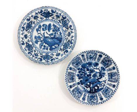 Depicitng garden scene with flowers and rocks, Kangxi Period, largest plate is 24 cm. in diameter. 