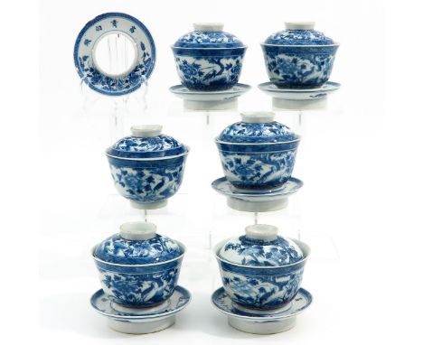 Blue and white floral decor, Kangxi Mark, 18th Century, cups are 10 cm. in diameter, chip and hairline.