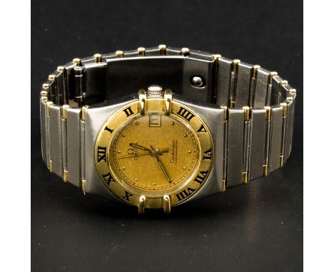 Chronometer, gold over steel, case is 26 mm. in diameter.
