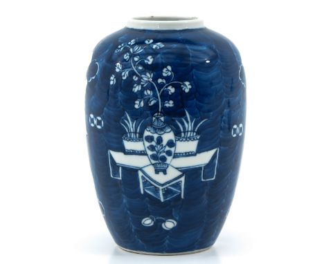 Dark blue ground with white floral blossom decor, Kangxi Mark, 19 cm. tall.