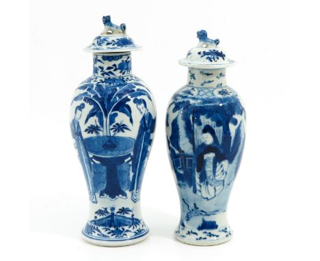 Decorated with Chinese figures, both marked Kangxi, tallest vase is 29 cm., in diverse conditions.