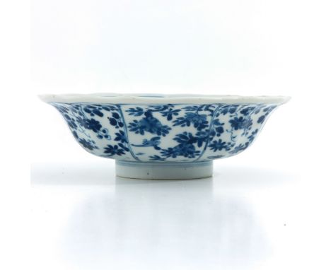 Depicting garden scene with butterfly and cricket, Kangxi Mark and Period, 19 cm. in diameter. 