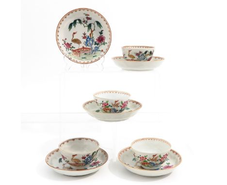 Including 4 cups and 5 saucers, depicting crane in garden, saucers are 14 cm. in diameter.