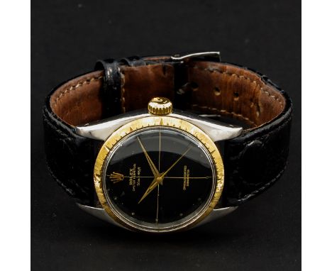 Chronometer, leather band, case is 35 mm. in diameter.