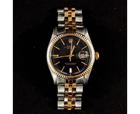Superlative chronometer, steel and gold band, case is 36 mm. diameter.