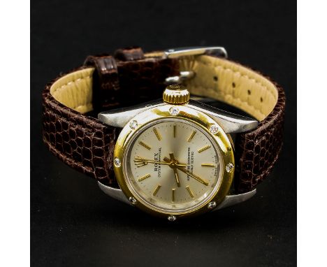 Superlative chronometer, on leather band, case is 25 mm. in diameter.