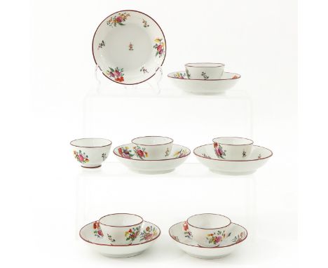 Saucers are 11 cm. in diameter.