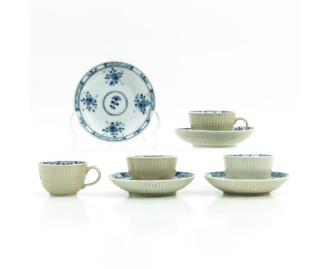 Chinese decor, including 4 cups and saucers 10 cm. in diameter.