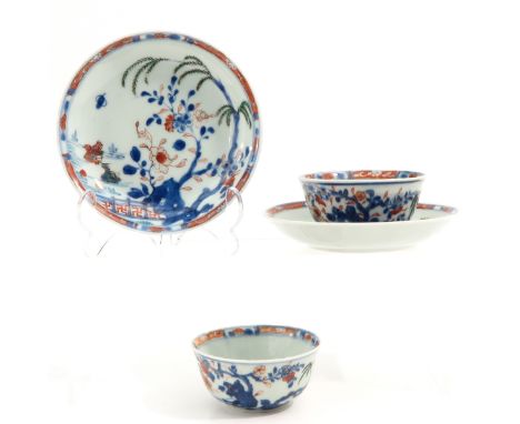Polychrome decor with flowers in garden and ducks on water, saucers are 14 cm. in diameter, chip.