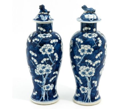 Dark blue ground with white floral blossom decor, Kangxi Mark, 28 cm. tall, in diverse conditions.