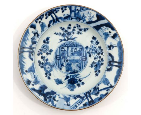 Decorated with Chinese figures and flowers, Kangxi Period, convex bottom, 23 cm. in diameter.