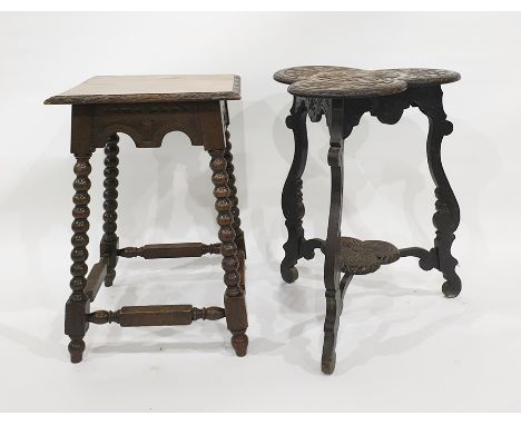 Two carved oak side tables, one on bobbin turned supports and the legs united by turned and block stretchers (2) 