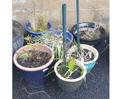 Seven assorted garden ceramic planters in blues and greens (7) 