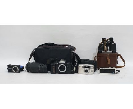 Various cameras to include a Nikon digital camera in original case, a Premium multimedia camera, a Sigma Nikon lens, etc (1 b