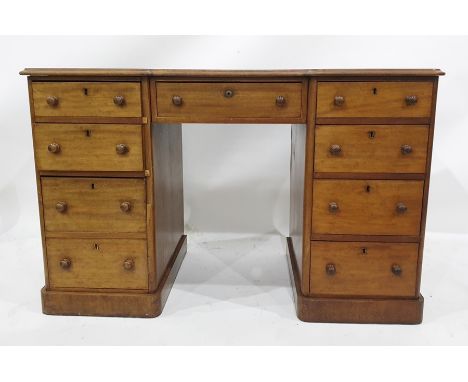 19th century mahogany breakfront desk with nine assorted drawers, raised upon plinth base, 122cm x 77.5cm