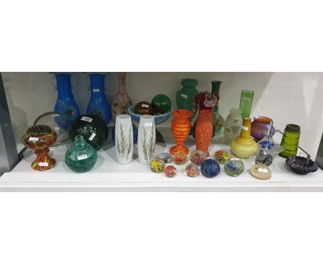 Collection of small and medium sized paperweights, various coloured glass balls, a red and white handkerchief vase, an irride