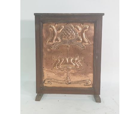 Cast iron fire surround with arched opening, Art Deco style iron fender and Art Deco style firescreen with hammered brass sur