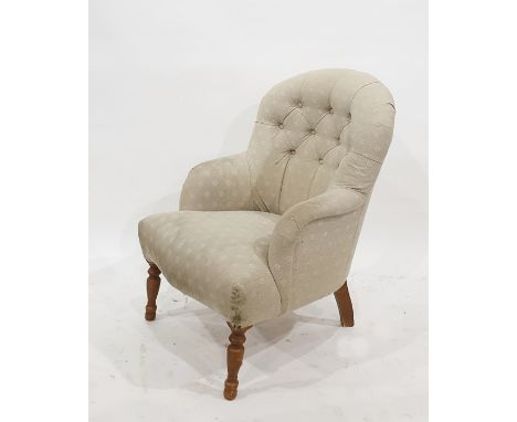 20th century modern armchair in grey ground button back upholstery, turned front legs