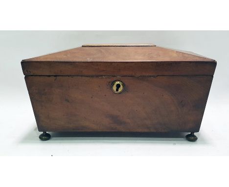 Mahogany sarcophagus-shaped tea caddy with brass escutcheon and brass bun feet and a brass-bodied oil lamp with chimney only 