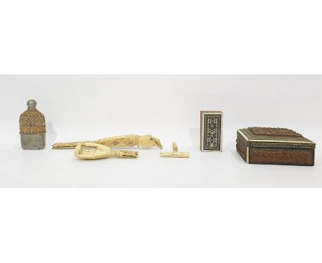 Pierced and carved bone back scratcher carved in the form of a hand (damaged), two hardwood and inlaid carved boxes and a met