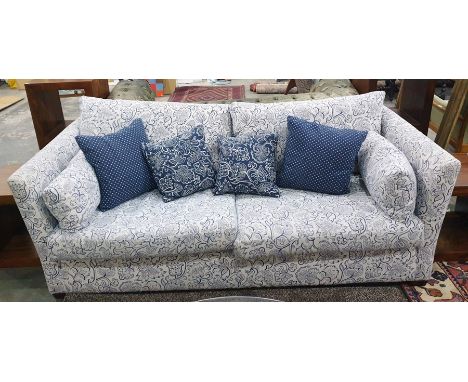 Three-seater sofa with white ground foliate patterned upholstery with scatter cushions Condition ReportSofa measures 210l x 9