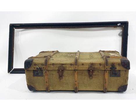 Vintage trunk, canvas and banded with wood, luggage labels , name printed on top with a large carved wood picture frame (2)