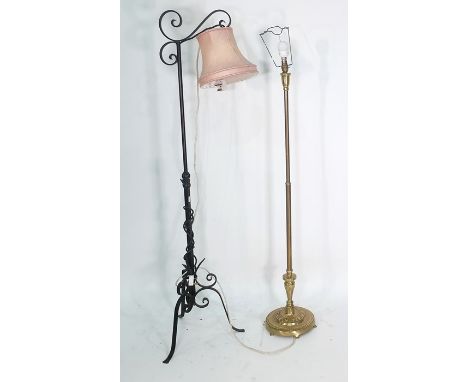 Wrought iron standard lamp and a brass standard lamp (2) 