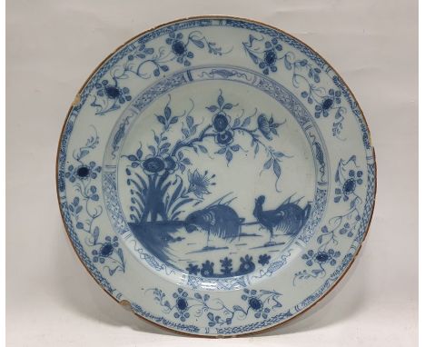 Antique delft-style ceramic plate painted in underglaze blue in the Chinese manner with cockerels and flowering branches, 36c