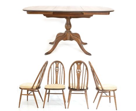 Ercol extending dining table and four swan back chairs. Standard: 103cm (40.5in) wide, 89.5cm (35in) deep, 73cm (29in) high. 